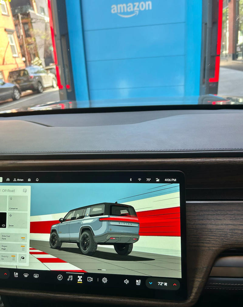 A Rivian employee took me on a test drive. It had two EVs featured in the store., Rivian had Boxed Water in a basket at the door., The decor was colorful, outdoorsy, and relaxed., A Rivian spokesperson told me that the store is designed for families., The store had a merchandise section with locally sourced reusable bags, A Rivian employee took me on a test drive., I didn't see too many customers during my visit., I went to Tesla's showroom in the Meatpacking District the next day., The store's design was tech-forward, sleek, and futuristic., Tesla had some interactive elements in the space., The wall posters were more show than tell., The space also showed off Tesla's tech., Tesla's Optimus humanoid robot was on display., The staff seemed used to tourists popping in and taking photos., I was offered an espresso while I waited for my test ride., To sum it up: I enjoyed both experiences.