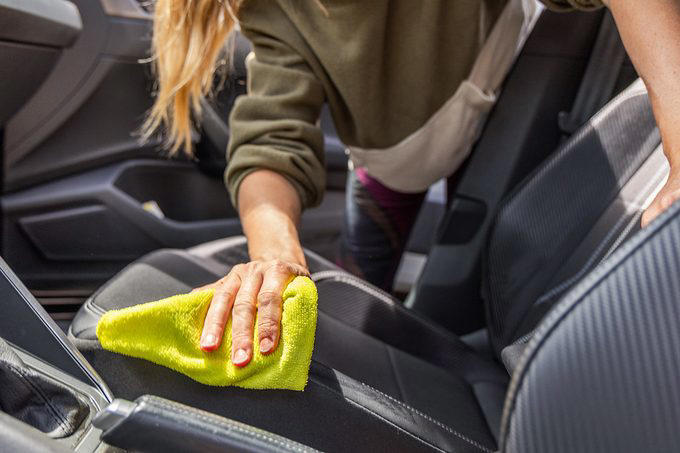 Avoid Eating or Drinking in the Car, Wipe Up Spills as Soon as They Happen, Keep Cleaning Supplies in the Car, Manage Trash, Vacuum the Car Interior Weekly, Use Floor Mats, Avoid Clutter, Use Idling Time Proactively, Watch What Passengers Bring Into the Car, Avoid Smoking, Clean the Exterior Too, Maintain a Cleaning Routine, About the Experts