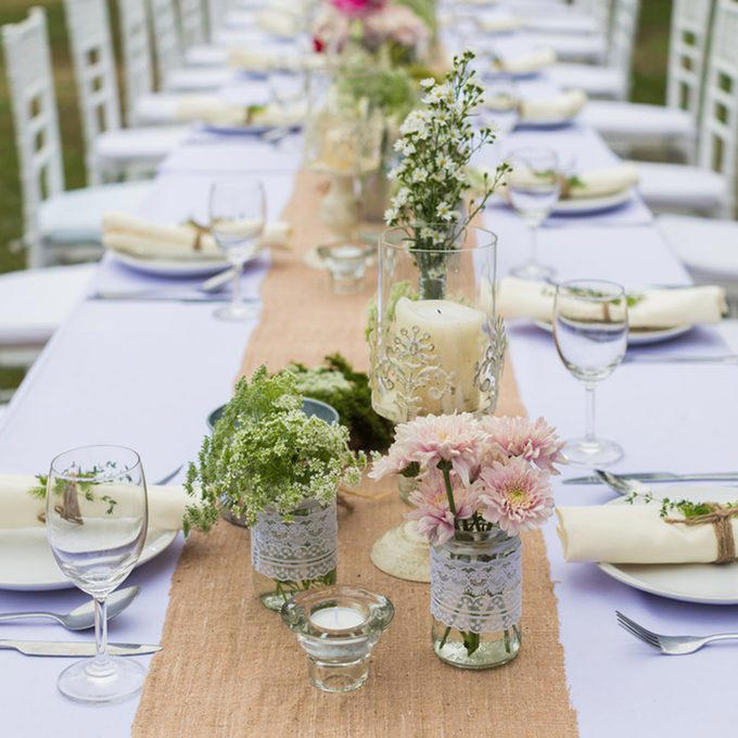 A Photo Journey of Your Story, Ample Outdoor Reception Lighting, Hang Chandeliers From Trees, Birdseed Confetti, DIY Photo Booth, Make Your Own Seating, Pallet Dance Floor, Succulent Wedding Gifts, DIY Wooden Wedding Arch, Tree Stump Centerpieces, Whimsical Light Bulbs Flower Holders, Lawn Games, Wooden Direction Signs, Use What You Have, DIY Wedding Decorations Concrete Numbers or Letters, Accommodate for the Weather, Arbor Seating, Use Your Resources Wisely, Marquee Letters