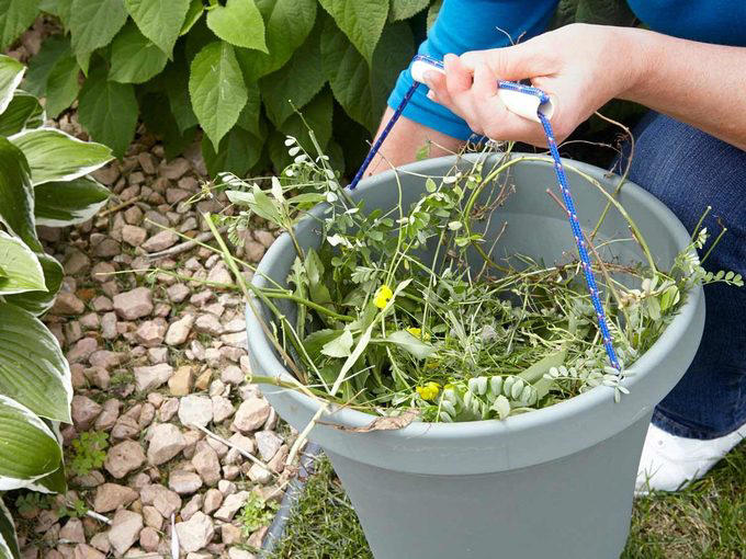 Coffee container, Hose reel, Ice trays, Foam beverage can holders, Use a pool noodle inside a drawer, 5-Gallon buckets, Paper tubes, Toothbrushes, Tennis balls, Milk jugs, Clamshell containers, Pipe insulation, Wine bottle, Gutter garden, Curtain rods, Mesh produce bag, Save your containers, PVC piping, Old clothing, Used or leftover building materials, Old rake, Packing peanuts, Use an old eyeglass case for hardware storage, Gardening tool hack, Wine cork caulk saver, Pop tops, Old sneaker, Bread tabs, Pie plate, Egg cartons, Tape containers, Wine box shoe storage, Garden hose, Old gloves, Three-ring binder spine, Painter’s plastic, Coffee bag ties, To-go coffee cup, Rx bottle for storing fasteners, Tissue box, Peanut butter jars, Golf tees, Bike inner tubes, Grated cheese container, Garment bag, Spray paint organizer, Flexible drainage pipe, Plastic shelving units, Wire mesh fence, Key ring, Toothbrush holder, Cooking cooling racks, Save those caps!, Pet collar, Old trash cans, Tomato cage, Cleaned out grill, Milk crates, Broken laundry basket, Floral water tubes, Drill box reuse, Floor tiles for drawer liners, Paint tray, Fence post, Electrical box, Twist ties, Clothespins, Electrical wire, Golf club covers, Yardstick, Shelf liner, Flowerpot drip pans, Laundry jug watering can, Bucket lids, Cereal box, Coffee carry-all, Bubble wrap®, Rubber chair leg cap, No-slide knee pads, Appliance and tool manuals, Chip clips