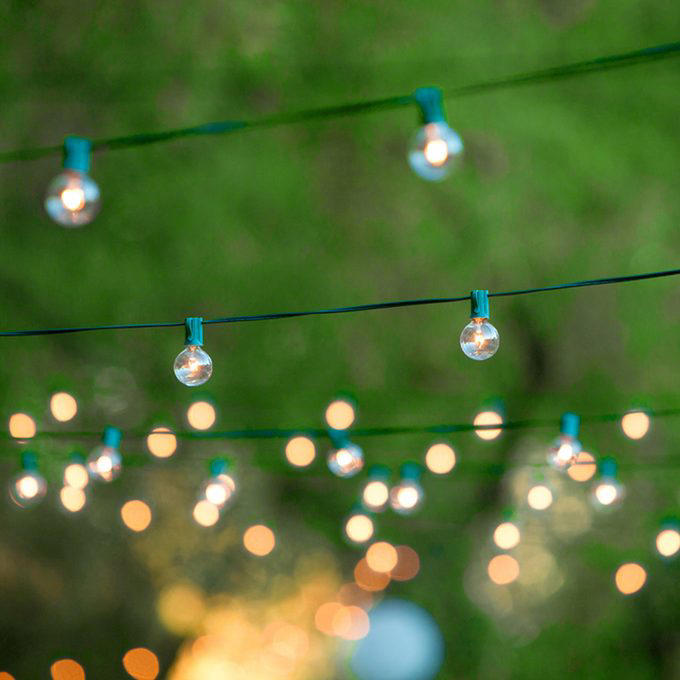 A Photo Journey of Your Story, Ample Outdoor Reception Lighting, Hang Chandeliers From Trees, Birdseed Confetti, DIY Photo Booth, Make Your Own Seating, Pallet Dance Floor, Succulent Wedding Gifts, DIY Wooden Wedding Arch, Tree Stump Centerpieces, Whimsical Light Bulbs Flower Holders, Lawn Games, Wooden Direction Signs, Use What You Have, DIY Wedding Decorations Concrete Numbers or Letters, Accommodate for the Weather, Arbor Seating, Use Your Resources Wisely, Marquee Letters