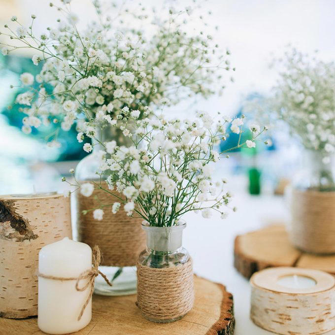 A Photo Journey of Your Story, Ample Outdoor Reception Lighting, Hang Chandeliers From Trees, Birdseed Confetti, DIY Photo Booth, Make Your Own Seating, Pallet Dance Floor, Succulent Wedding Gifts, DIY Wooden Wedding Arch, Tree Stump Centerpieces, Whimsical Light Bulbs Flower Holders, Lawn Games, Wooden Direction Signs, Use What You Have, DIY Wedding Decorations Concrete Numbers or Letters, Accommodate for the Weather, Arbor Seating, Use Your Resources Wisely, Marquee Letters