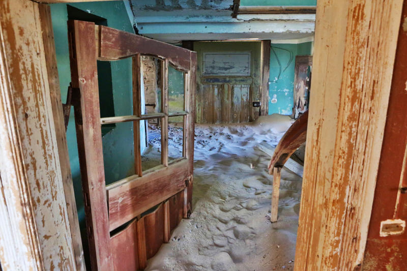 Virginia City, USA, Craco, Italy, Terlingua, USA, Hashima Island, Japan, Kennecott, USA, Kolmanskop, Namibia, Animas Forks, USA, Ross Island, India, Rhyolite, USA, Oradour-sur-Glane, France, Calico, USA, Bodie, USA, Glenrio, USA, Garnet, USA, Kayaköy, Turkey