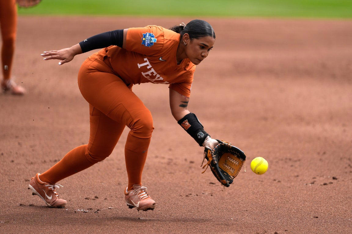 Texas defeats Florida 3-0 in WCWS opener, in photos