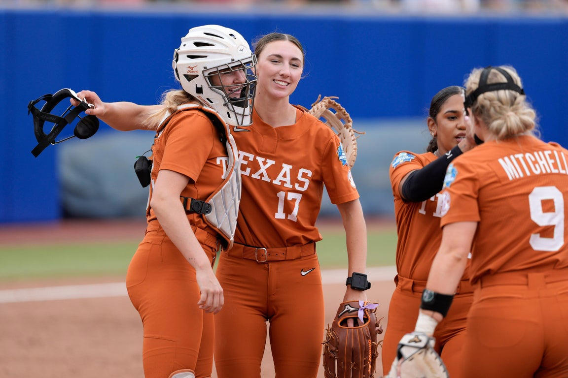 Texas defeats Florida 3-0 in WCWS opener, in photos