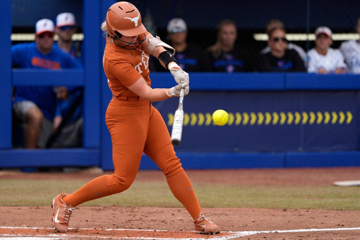 Texas defeats Florida 3-0 in WCWS opener, in photos