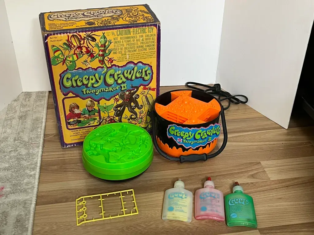 3. Creepy Crawlers ThingMaker 1. CSI Fingerprint Examination Kit, 2. Johnny Reb Cannon, 3. Fisher-Price Power Wheels, 4. Pogo Balls, 5. Moon Shoes, 6. Mad Science Kits, 7. Stretch Armstrong, 8. Big Wheel Tricycles, 9. Water Wiggle, 10. Super Elastic Bubble Plastic, 11. Zulu Blowgun, 12. Wham-O Air Blaster, 13. Rocket Firing Boba Fett, 14. Space Hoppers, 15. Plastic Sword and Shield Sets, 16. Super Elastic Bubble Plastic, 17. Dip-a-Flower, 18. Disc-o-Punch, 19. Wham-O Slip N’ Slide, 20. Shrinky Dinks, 21. Lawn Darts or Jarts, 22. Clackers, 23. Creepy Crawlers ThingMaker, 24. Battlestar Galactica Missile-Firing Toys, 25. Gilbert U-238 Atomic Energy Lab, 26. Snacktime Cabbage Patch Kid, 27. Sky Dancers, 28. Easy-Bake Oven, 29. Kenner’s Alien Action Figure, 30. Slap Bracelets