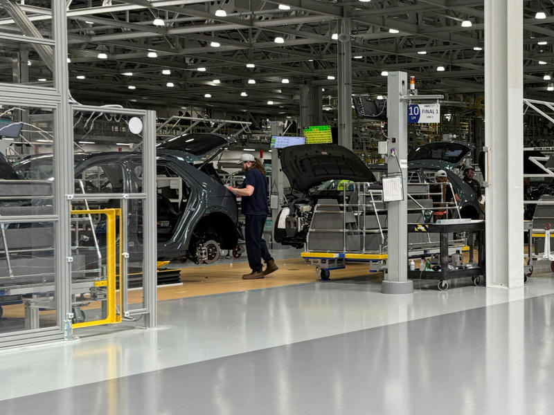 The vehicles' interiors are then assembled by hand. My tour began in the plant's modern main lobby., The Metaplant site consists of 11 buildings totalling 7.5 million square feet of space., Stamped parts are transported by automated guided vehicles, or AGVs., The stamped metal panels are then stored in these massive racks., Here are parts of the Ioniq 9, Hyundai's new flagship three-row EV SUV., The next part of the tour is the welding shop., The vehicles' interiors are then assembled by hand.