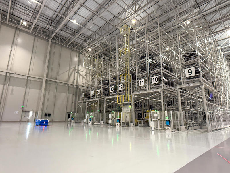 The stamped metal panels are then stored in these massive racks. My tour began in the plant's modern main lobby., The Metaplant site consists of 11 buildings totalling 7.5 million square feet of space., Stamped parts are transported by automated guided vehicles, or AGVs., The stamped metal panels are then stored in these massive racks., Here are parts of the Ioniq 9, Hyundai's new flagship three-row EV SUV., The next part of the tour is the welding shop., The vehicles' interiors are then assembled by hand.