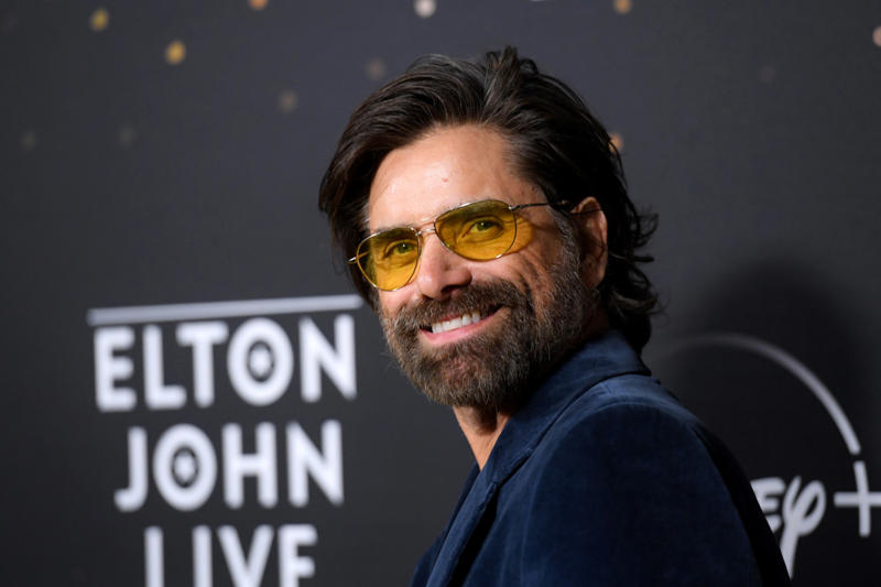 John Stamos John Stamos, Brie Larson, Michael J. Fox, Sarah Hyland, Colin Farrell, Frankie Muniz, Courteney Cox, Matthew Perry, Lisa Kudrow, John Boyega, Raven-Symoné, Avan Jogia, Ethan Embry