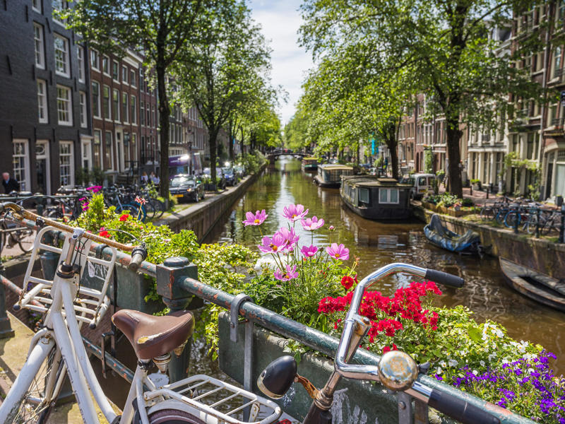 Only visiting Amsterdam, Traveling to popular tourist destinations without planning ahead, Expecting small talk, Walking in the bike lane, Anticipating American-style customer service, Booking accommodations in the city center