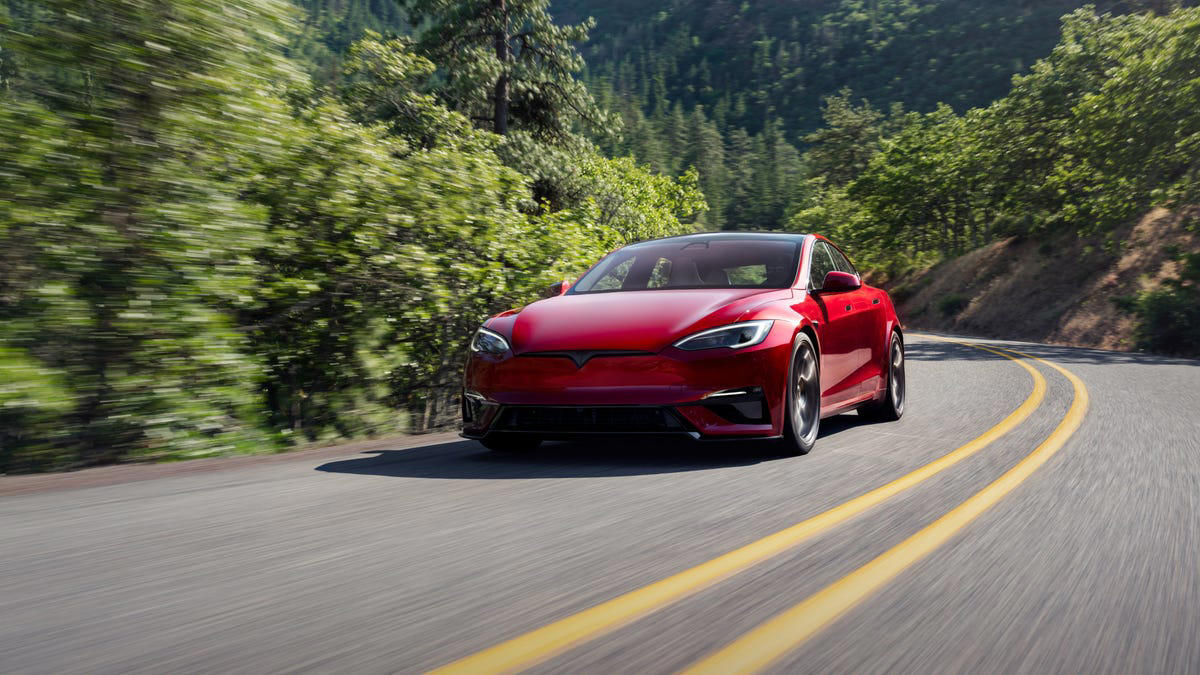 #1: Tesla Model 3, #2: Tesla Model Y, #3: Tesla Model S, #4: Tesla Model X, #5: Jeep Gladiator, #6: Kia EV6, #7: Honda Ridgeline, #8: Honda Odyssey, #9: Honda Passport, #10: Volkswagen ID.4
