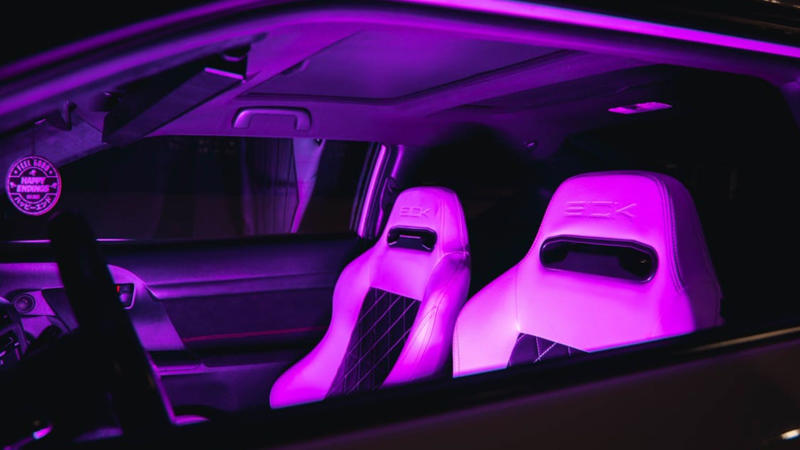 1. Phone Mount That Holds, 2. LED Bulbs For Headlights, 3. Padded Armrest Cover, 4. Cabin Air Filter Replacement, 5. Blind Spot Mirrors, 6. Seat Gap Filler Pads, 7. Rubber Floor Mats, 8. Steering Wheel Cover That Grips, 9. Bluetooth FM Transmitter, 10. Valve Stem Caps With Pressure Indicators, 11. Magnetic Sunshade For Windshield, 12. Quick-Charge USB Adapter, 13. Hydrophobic Wiper Blades, 14. Rear Seat Hook Attachments, 15. Hood Struts That Actually Work, 16. Trunk Organizer With Compartments, 17. Key Fob Shell Replacement, 18. Portable Jump Starter, 19. Door Edge Guards, 20. Interior LED Light Swap