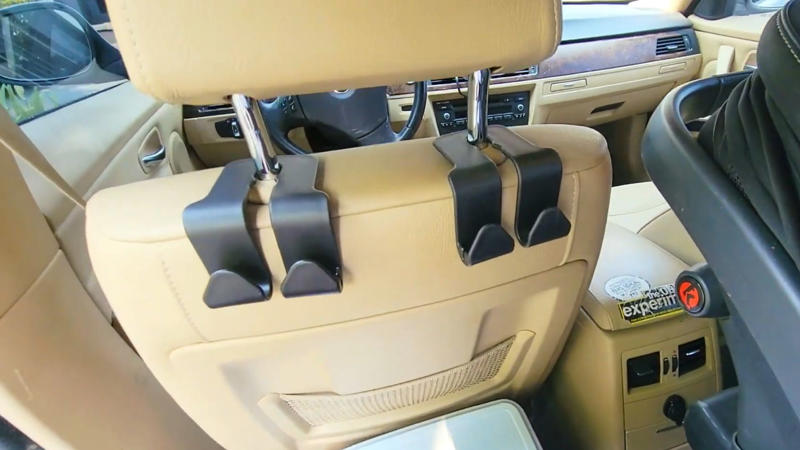 1. Phone Mount That Holds, 2. LED Bulbs For Headlights, 3. Padded Armrest Cover, 4. Cabin Air Filter Replacement, 5. Blind Spot Mirrors, 6. Seat Gap Filler Pads, 7. Rubber Floor Mats, 8. Steering Wheel Cover That Grips, 9. Bluetooth FM Transmitter, 10. Valve Stem Caps With Pressure Indicators, 11. Magnetic Sunshade For Windshield, 12. Quick-Charge USB Adapter, 13. Hydrophobic Wiper Blades, 14. Rear Seat Hook Attachments, 15. Hood Struts That Actually Work, 16. Trunk Organizer With Compartments, 17. Key Fob Shell Replacement, 18. Portable Jump Starter, 19. Door Edge Guards, 20. Interior LED Light Swap