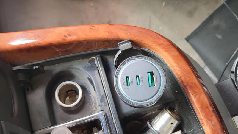 1. Phone Mount That Holds, 2. LED Bulbs For Headlights, 3. Padded Armrest Cover, 4. Cabin Air Filter Replacement, 5. Blind Spot Mirrors, 6. Seat Gap Filler Pads, 7. Rubber Floor Mats, 8. Steering Wheel Cover That Grips, 9. Bluetooth FM Transmitter, 10. Valve Stem Caps With Pressure Indicators, 11. Magnetic Sunshade For Windshield, 12. Quick-Charge USB Adapter, 13. Hydrophobic Wiper Blades, 14. Rear Seat Hook Attachments, 15. Hood Struts That Actually Work, 16. Trunk Organizer With Compartments, 17. Key Fob Shell Replacement, 18. Portable Jump Starter, 19. Door Edge Guards, 20. Interior LED Light Swap