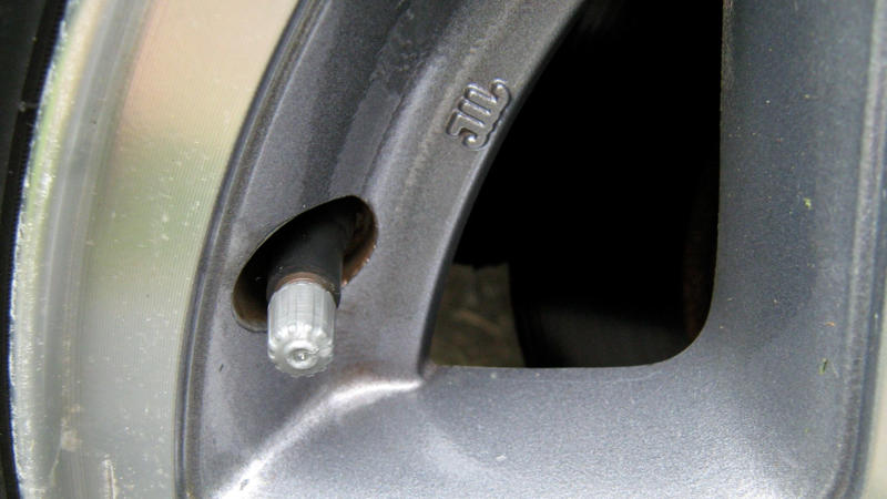 1. Phone Mount That Holds, 2. LED Bulbs For Headlights, 3. Padded Armrest Cover, 4. Cabin Air Filter Replacement, 5. Blind Spot Mirrors, 6. Seat Gap Filler Pads, 7. Rubber Floor Mats, 8. Steering Wheel Cover That Grips, 9. Bluetooth FM Transmitter, 10. Valve Stem Caps With Pressure Indicators, 11. Magnetic Sunshade For Windshield, 12. Quick-Charge USB Adapter, 13. Hydrophobic Wiper Blades, 14. Rear Seat Hook Attachments, 15. Hood Struts That Actually Work, 16. Trunk Organizer With Compartments, 17. Key Fob Shell Replacement, 18. Portable Jump Starter, 19. Door Edge Guards, 20. Interior LED Light Swap