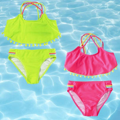 A colorblock one-piece, A lime green swim set for boys, A one-piece rash guard for babies and up, A pair of lime boy's trunks with shark design, A neon orange rash guard, A pair of swim trucks for toddlers, Neon yellow trunks for babies and toddlers, A tangerine off-the-shoulder one-piece, A cross-back bikini with pom pom detail, A puff-sleeve two-piece, A three-piece girl's swimsuit, Vans board shorts for tweens, A UV-protective rash guard for girls, An orange flutter suit for toddlers and above, A neon yellow cut-out one-piece, Related...