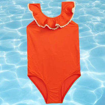 A colorblock one-piece, A lime green swim set for boys, A one-piece rash guard for babies and up, A pair of lime boy's trunks with shark design, A neon orange rash guard, A pair of swim trucks for toddlers, Neon yellow trunks for babies and toddlers, A tangerine off-the-shoulder one-piece, A cross-back bikini with pom pom detail, A puff-sleeve two-piece, A three-piece girl's swimsuit, Vans board shorts for tweens, A UV-protective rash guard for girls, An orange flutter suit for toddlers and above, A neon yellow cut-out one-piece, Related...