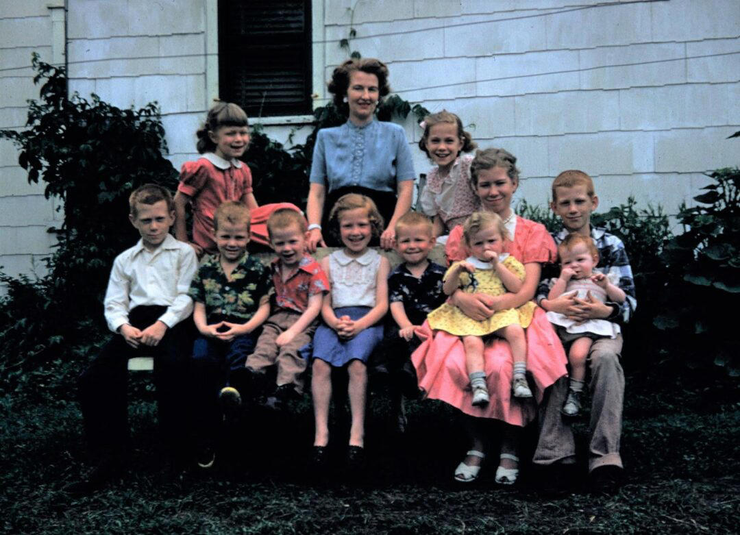 6. A Mother With Her First 11 Kids — She Went on to Have Six More 1. 22-Year-Old Being Dropped Off for Naval Flight Training in South Texas, 2. NASA Scientists With Their Board of Calculations, 3. Queen Elizabeth II Driving Prince Charles and Princess Anne, 4. Kids on a Movie Date, 5. Audrey Hepburn Casually Grocery Shopping With Her Pet Deer, 6. A Mother With Her First 11 Kids — She Went on to Have Six More, 7. The Runner-Up in a Shirley Temple Look-Alike Contest, 8. Macy’s Thanksgiving Day Parade, 9. Sightseers at Niagara Falls, 10. The First African-American Stewardess in the U.S., Ruth Carol Taylor, 11. Open Air School in the Netherlands, 12. The Original TV Remote, 13. Mingling With Bears at Yellowstone, 14. Roadside Meals While Traveling, 15. Listening to Music at a Record Store, 16. Getting Cooled Air Piped Into the Car While Eating at a Drive-in Restaurant, 17. Selfie: 1957 Style, 18. Teenage Beatles Members Performing as Wedding Singers, 19. Bride and Groom, 20. Danish Zookeeper Watering the Emperor Penguins, 21. A Couple’s First Christmas Together, 22. Daytona Beach, 23. Joe Pesci at 14 Years Old, 24. Woman in One of Nine Stores She Opened, 25. Family Pool Day, 26. Elizabeth Eckford, One of the Nine Black Students Who Integrated Into Little Rock’s Central High School, 27. Oh, You Know, Just a Llama in Times Square, 28. Jayne Mansfield With Miss Hollywood, 29. Illegal Drag Racing in the L.A. River Basin