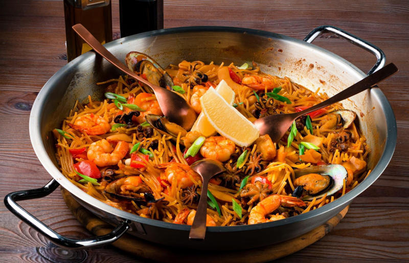 8. Fideuà, Spain 36. Pasta frittata, Italy, 35. Cincinnati chilli, USA, 34. Naporitan, Japan, 33. Linguine alla Nerano, Italy, 32. Baked ziti, USA, 31. Fuži s tartufima, Croatia, 30. American chop suey, USA, 29. Kasha varnishkes, USA, 28. Pastitsio, Greece, 27. Pasta con le sarde, Italy, 26. Sorrentinos, Argentina, 25. Pasta alla Norma, Italy, 24. Krautfleckerl, Austria, 23. Pasta e fagioli, Italy, 22. Filipino spaghetti, Philippines, 21. Pasta primavera, Canada or USA, 20. Tortellini alla panna, Italy, 19. Tallarines verdes, Peru, 18. Koshari, Egypt, 17. Pasta puttanesca, Italy, 16. Älplermagronen, Switzerland, 15. Fettuccine Alfredo, Italy and USA, 14. Cacio e pepe, Italy, 13. Uni pasta, Japan, 12. Gratin de crozets, France, 11. Spaghetti alla vongole, Italy, 10. Giouvetsi, Greece, 9. Ravioli, Italy, 8. Fideuà, Spain, 7. Pasta pomodoro, Italy, 6. Spaghetti Bolognese, UK and USA, 5. Cannelloni, Italy, 4. Mac 'n' cheese, Italy and UK, 3. Pasta alla carbonara, Italy, 2. Käsespätzle, various locations