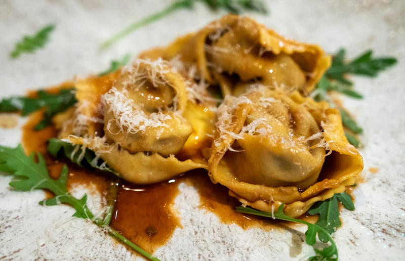 9. Ravioli, Italy 36. Pasta frittata, Italy, 35. Cincinnati chilli, USA, 34. Naporitan, Japan, 33. Linguine alla Nerano, Italy, 32. Baked ziti, USA, 31. Fuži s tartufima, Croatia, 30. American chop suey, USA, 29. Kasha varnishkes, USA, 28. Pastitsio, Greece, 27. Pasta con le sarde, Italy, 26. Sorrentinos, Argentina, 25. Pasta alla Norma, Italy, 24. Krautfleckerl, Austria, 23. Pasta e fagioli, Italy, 22. Filipino spaghetti, Philippines, 21. Pasta primavera, Canada or USA, 20. Tortellini alla panna, Italy, 19. Tallarines verdes, Peru, 18. Koshari, Egypt, 17. Pasta puttanesca, Italy, 16. Älplermagronen, Switzerland, 15. Fettuccine Alfredo, Italy and USA, 14. Cacio e pepe, Italy, 13. Uni pasta, Japan, 12. Gratin de crozets, France, 11. Spaghetti alla vongole, Italy, 10. Giouvetsi, Greece, 9. Ravioli, Italy, 8. Fideuà, Spain, 7. Pasta pomodoro, Italy, 6. Spaghetti Bolognese, UK and USA, 5. Cannelloni, Italy, 4. Mac 'n' cheese, Italy and UK, 3. Pasta alla carbonara, Italy, 2. Käsespätzle, various locations