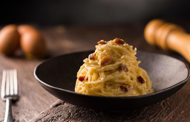 3. Pasta alla carbonara, Italy 36. Pasta frittata, Italy, 35. Cincinnati chilli, USA, 34. Naporitan, Japan, 33. Linguine alla Nerano, Italy, 32. Baked ziti, USA, 31. Fuži s tartufima, Croatia, 30. American chop suey, USA, 29. Kasha varnishkes, USA, 28. Pastitsio, Greece, 27. Pasta con le sarde, Italy, 26. Sorrentinos, Argentina, 25. Pasta alla Norma, Italy, 24. Krautfleckerl, Austria, 23. Pasta e fagioli, Italy, 22. Filipino spaghetti, Philippines, 21. Pasta primavera, Canada or USA, 20. Tortellini alla panna, Italy, 19. Tallarines verdes, Peru, 18. Koshari, Egypt, 17. Pasta puttanesca, Italy, 16. Älplermagronen, Switzerland, 15. Fettuccine Alfredo, Italy and USA, 14. Cacio e pepe, Italy, 13. Uni pasta, Japan, 12. Gratin de crozets, France, 11. Spaghetti alla vongole, Italy, 10. Giouvetsi, Greece, 9. Ravioli, Italy, 8. Fideuà, Spain, 7. Pasta pomodoro, Italy, 6. Spaghetti Bolognese, UK and USA, 5. Cannelloni, Italy, 4. Mac 'n' cheese, Italy and UK, 3. Pasta alla carbonara, Italy, 2. Käsespätzle, various locations