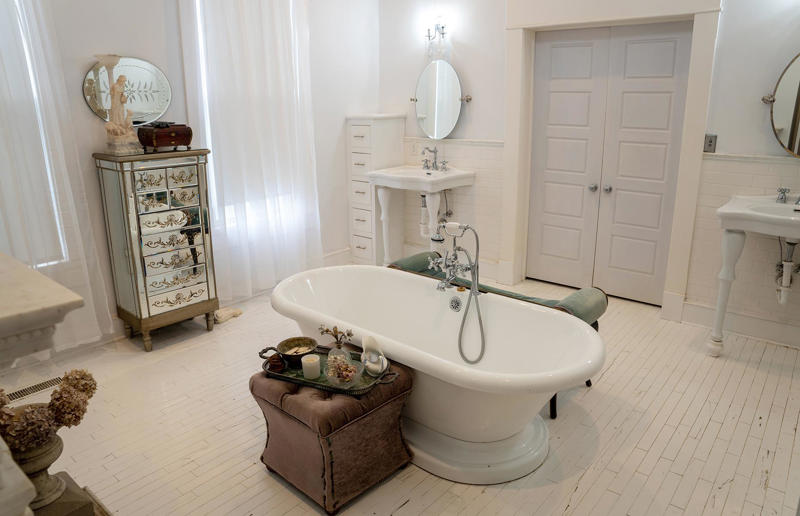 After: the bathroom The resurrection of a ruined home, A restoration journey, Finding a fixer-upper, Buying a teardown, The house today, Before: the porch, After: the porch, Before: the hallway, After: the hallway, Before: the living room, After: the living room, Before: the bedroom, After: the bedroom, Before: the bathroom, After: the bathroom, Before: the dining room, After: the dining room, After: the kitchen, Getting their hands dirty, What's next?