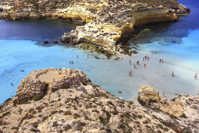 8: Isola dei Conigli - Lampedusa, Italy 24: Magens Bay - St. Thomas, US Virgin Islands, 23: Playa Norte - Isla das Mulheres, Mexico, 22: Nissi Beach - Ayia Napa, Cyprus, 21: Falassarna Beach - Crete, Greece, 20: Nungwi Beach - Zanzibar, Tanzania, 19: Ipanema Beach, Rio de Janeiro, Brazil, 18: Playa Manuel Antonio - Manuel Antonio National Park, Costa Rica, 17: Playa de Muro Beach - Mallorca, Spain, 16: Kelingking Beach - Nusa Penida, Indonesia, 15: La Concha Beach - San Sebastián – Donostia, Spain, 14: Seven Mile Beach - Cayman Islands, United Kingdom, 13: Manly Beach - Sydney, Australia, 12: Driftwood Beach - Jekyll Island - Golden Isles of Georgia - Georgia, USA, 11: Siesta Beach - Siesta Key - Florida, USA, 10: Ka'anapali Beach - Lahaina - Maui, Hawaii, 9: Varadero Beach - Varadero, Cuba, 8: Isola dei Conigli - Lampedusa, Italy, 7: Radhanagar Beach - Havelock Island, India, 6: Falésia Beach - Albufeira, Portugal, 5: Grace Bay - Turks and Caicos Islands, United Kingdom, 4: Reynisfjara Beach - Vik, Iceland