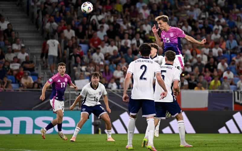 10:56 PM BST, 10:55 PM BST, Man of the match, 10:55 PM BST, Lee Carsley speaking to Channel 4, 10:51 PM BST, Trophy time, 10:48 PM BST, Player of the tournament is..., 10:48 PM BST, Runners-up, 10:45 PM BST, FT stats, 10:44 PM BST, England’s player of the tournament celebrates, 10:43 PM BST, The thoughts of Jonathan Rowe, 10:42 PM BST, Joy for Carsley, 10:41 PM BST, Mixed feelings for Tuchel?, 10:36 PM BST, Back-to-back European champions, 10:34 PM BST, England win the 2025 Under-21 European Championships, 10:32 PM BST, 120 mins: England 3 Germany 2, 10:31 PM BST, 119 mins: England 3 Germany 2, 10:29 PM BST, 118 mins: England 3 Germany 2, 10:28 PM BST, 117 mins: England 3 Germany 2, 10:28 PM BST, 116 mins: England 3 Germany 2, 10:26 PM BST, 115 mins: England 3 Germany 2, 10:25 PM BST, 113 mins: England 3 Germany 2, 10:24 PM BST, 112 mins: England 3 Germany 2, 10:23 PM BST, 111 mins: England 3 Germany 2, 10:20 PM BST, 109 mins: England 3 Germany 2, 10:19 PM BST, 107 mins: England 3 Germany 2, 10:16 PM BST, Second period of extra time, 10:14 PM BST, HT in extra time, 10:13 PM BST, 105 mins: England 3 Germany 2, 10:12 PM BST, 104 mins: England 3 Germany 2, 10:11 PM BST, 103 mins: England 3 Germany 2, 10:09 PM BST, 102 mins: England 3 Germany 2, 10:06 PM BST, 98 mins: England 3 Germany 2, 10:05 PM BST, 97 mins: England 3 Germany 2, 09:59 PM BST, GOAL! Rowe restores England’s lead, 09:58 PM BST, Start of extra time, 09:53 PM BST, End of normal time, 09:51 PM BST, 90+3 mins: England 2 Germany 2, 09:50 PM BST, 90+2 mins: England 2 Germany 2, 09:48 PM BST, 90 mins: England 2 Germany 2, 09:46 PM BST, 88 mins: England 2 Germany 2, 09:44 PM BST, 85 mins: England 2 Germany 2, 09:42 PM BST, 84 mins: England 2 Germany 2, 09:41 PM BST, 83 mins: England 2 Germany 2, 09:40 PM BST, 81 mins: England 2 Germany 2, 09:38 PM BST, 80 mins: England 2 Germany 2, 09:37 PM BST, 79 mins: England 2 Germany 2, 09:36 PM BST, 78 mins: England 2 Germany 2, 09:34 PM BST, 75 mins: England 2 Germany 2, 09:32 PM BST, 73 mins: England 2 Germany 2, 09:29 PM BST, 71 mins: England 2 Germany 2, 09:28 PM BST, 70 mins: England 2 Germany 2, 09:27 PM BST, 68 mins: England 2 Germany 2, 09:25 PM BST, 66 mins: England 2 Germany 2, 09:22 PM BST, 64 mins: England 2 Germany 2, 09:20 PM BST, 62 mins: England 2 Germany 2, 09:19 PM BST, GOAL! Nebel pulls Germany level, 09:18 PM BST, 60 mins: England 2 Germany 1, 09:16 PM BST, 57 mins: England 2 Germany 1, 09:13 PM BST, 55 mins: England 2 Germany 1, 09:11 PM BST, 52 mins: England 2 Germany 1, 09:10 PM BST, 51 mins: England 2 Germany 1, 09:09 PM BST, 50 mins: England 2 Germany 1, 09:08 PM BST, 49 mins: England 2 Germany 1, 09:03 PM BST, Second half, 08:58 PM BST, What will Tuchel have thought of that first half?, 08:54 PM BST, Elliott’s fantastic tournament, 08:51 PM BST, HT stats, 08:48 PM BST, Half time, 08:46 PM BST, GOAL! Weiper gets one back for Germany, 08:46 PM BST, 45 mins: England 2 Germany 0, 08:44 PM BST, 43 mins: England 2 Germany 0, 08:41 PM BST, 41 mins: England 2 Germany 0, 08:39 PM BST, 39 mins: England 2 Germany 0, 08:37 PM BST, 37 mins: England 2 Germany 0, 08:35 PM BST, 34 mins: England 2 Germany 0, 08:33 PM BST, 32 mins: England 2 Germany 0, 08:30 PM BST, 29 mins: England 2 Germany 0, 08:24 PM BST, GOAL! Hutchinson doubles England’s lead, 08:24 PM BST, 24 mins: England 1 Germany 0, 08:23 PM BST, 22 mins: England 1 Germany 0, 08:20 PM BST, 19 mins: England 1 Germany 0, 08:17 PM BST, 16 mins: England 1 Germany 0, 08:15 PM BST, 14 mins: England 1 Germany 0, 08:12 PM BST, 11 mins: England 1 Germany 0, 08:05 PM BST, GOAL! Elliott fires England into the lead, 08:03 PM BST, 2 mins: England 0 Germany 0, 08:00 PM BST, Kick-off, 07:55 PM BST, Anthem time, 07:52 PM BST, Reminder of the teams, 07:49 PM BST, Tuchel has made it!, 07:44 PM BST, Hands-on approach from Carsley, 07:42 PM BST, Connection between the Lionesses and the Young Lions, 07:39 PM BST, Gearing up, 07:33 PM BST, England’s leading scorer at the tournament, 07:25 PM BST, Two managers conversing, 07:19 PM BST, Taking in their surroundings, 07:15 PM BST, Back in 2023, 07:06 PM BST, Full team news, 07:03 PM BST, What they are playing for, 07:00 PM BST, Numbers from the tournament, 06:56 PM BST, Germany team news, 06:56 PM BST, Top scorers in the tournament, 06:54 PM BST, Carsley getting things ready for his players, 06:49 PM BST, England team news, 06:47 PM BST, Germany’s route to the final, 06:44 PM BST, England’s route to the final, 06:33 PM BST, 06:32 PM BST, Lee Carsley has full confidence in his England team