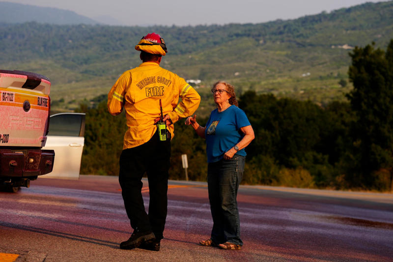 See firefighters battle Wolf Fire in Southern California as residents evacuate