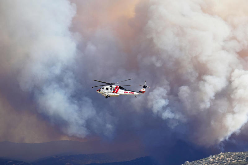 See firefighters battle Wolf Fire in Southern California as residents evacuate