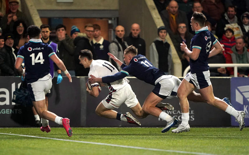 04:46 PM BST, Thanks for reading, 04:31 PM BST, England co-captain Tom Burrow:, 04:27 PM BST, Scotland captain Johnny Ventisei, 04:22 PM BST, Full time: England 56-19 Scotland, 04:17 PM BST, 76 mins: England 56-19 Scotland, 04:16 PM BST, 75 mins: England 56-12 Scotland, 04:13 PM BST, 71 mins: England 49-12 Scotland, 04:11 PM BST, 70 mins: England 42-12 Scotland, 04:09 PM BST, 69 mins: England 42-12 Scotland, 04:07 PM BST, 67 mins: England 42-12 Scotland, 04:05 PM BST, 66 mins: England 42-12 Scotland, 04:02 PM BST, 62 mins: England 42-12 Scotland, 03:56 PM BST, 56 mins: England 42-12 Scotland, 03:50 PM BST, Red card for George Timmins, 03:47 PM BST, 54 mins: England 42-12 Scotland, 03:44 PM BST, 52 mins: England 42-12 Scotland, 03:42 PM BST, 50 mins: England 42-12 Scotland, 03:40 PM BST, 48 mins: England 42-12 Scotland, 03:37 PM BST, 44: England 42-12 Scotland, 03:35 PM BST, Second half imminent, 03:33 PM BST, Half time: England 42-12 Scotland, 03:19 PM BST, Half time: England 42-12 Scotland, 03:15 PM BST, 38 mins: England 42-12 Scotland, 03:10 PM BST, 33 mins: England 35-12 Scotland, 03:06 PM BST, 28 mins: England 28-12 Scotland, 03:04 PM BST, 28 mins: England 21-12 Scotland, 03:03 PM BST, 26 mins: England 21-12 Scotland, 03:00 PM BST, 22 mins: England 21-12 Scotland, 02:58 PM BST, 20 mins: England 21-12 Scotland, 02:56 PM BST, 18 mins: England 21-12 Scotland, 02:54 PM BST, 17 mins: England 14-12 Scotland, 02:50 PM BST, 15 mins: England 14-12 Scotland, 02:46 PM BST, 10 mins: England 7-12 Scotland, 02:43 PM BST, 9 mins: England 7-5 Scotland, 02:40 PM BST, 7 mins: England 5-0 Scotland, 02:33 PM BST, Kick off, 02:30 PM BST, Expect some “cellies”, 02:23 PM BST, Some familiar names, 02:15 PM BST, How England might be preparing, 02:06 PM BST, Can Scotland break duck?, 01:59 PM BST, Scotland’s 23, 01:55 PM BST, England’s 23, 01:45 PM BST, Preview: Can England defend their title?