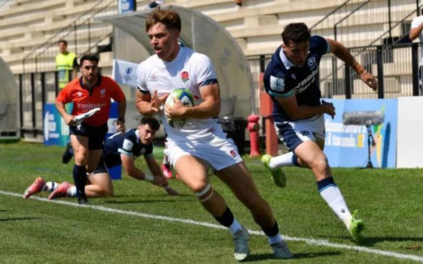 04:46 PM BST, Thanks for reading, 04:31 PM BST, England co-captain Tom Burrow:, 04:27 PM BST, Scotland captain Johnny Ventisei, 04:22 PM BST, Full time: England 56-19 Scotland, 04:17 PM BST, 76 mins: England 56-19 Scotland, 04:16 PM BST, 75 mins: England 56-12 Scotland, 04:13 PM BST, 71 mins: England 49-12 Scotland, 04:11 PM BST, 70 mins: England 42-12 Scotland, 04:09 PM BST, 69 mins: England 42-12 Scotland, 04:07 PM BST, 67 mins: England 42-12 Scotland, 04:05 PM BST, 66 mins: England 42-12 Scotland, 04:02 PM BST, 62 mins: England 42-12 Scotland, 03:56 PM BST, 56 mins: England 42-12 Scotland, 03:50 PM BST, Red card for George Timmins, 03:47 PM BST, 54 mins: England 42-12 Scotland, 03:44 PM BST, 52 mins: England 42-12 Scotland, 03:42 PM BST, 50 mins: England 42-12 Scotland, 03:40 PM BST, 48 mins: England 42-12 Scotland, 03:37 PM BST, 44: England 42-12 Scotland, 03:35 PM BST, Second half imminent, 03:33 PM BST, Half time: England 42-12 Scotland, 03:19 PM BST, Half time: England 42-12 Scotland, 03:15 PM BST, 38 mins: England 42-12 Scotland, 03:10 PM BST, 33 mins: England 35-12 Scotland, 03:06 PM BST, 28 mins: England 28-12 Scotland, 03:04 PM BST, 28 mins: England 21-12 Scotland, 03:03 PM BST, 26 mins: England 21-12 Scotland, 03:00 PM BST, 22 mins: England 21-12 Scotland, 02:58 PM BST, 20 mins: England 21-12 Scotland, 02:56 PM BST, 18 mins: England 21-12 Scotland, 02:54 PM BST, 17 mins: England 14-12 Scotland, 02:50 PM BST, 15 mins: England 14-12 Scotland, 02:46 PM BST, 10 mins: England 7-12 Scotland, 02:43 PM BST, 9 mins: England 7-5 Scotland, 02:40 PM BST, 7 mins: England 5-0 Scotland, 02:33 PM BST, Kick off, 02:30 PM BST, Expect some “cellies”, 02:23 PM BST, Some familiar names, 02:15 PM BST, How England might be preparing, 02:06 PM BST, Can Scotland break duck?, 01:59 PM BST, Scotland’s 23, 01:55 PM BST, England’s 23, 01:45 PM BST, Preview: Can England defend their title?