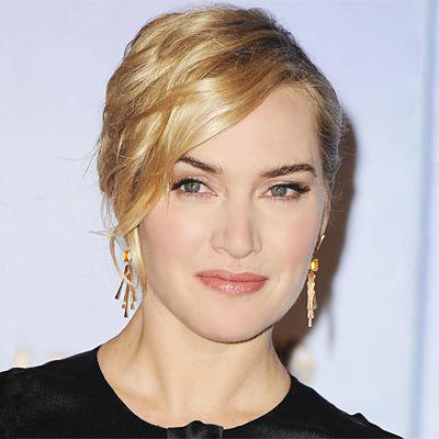 Sideswept in 2012 Fresh-Faced in 1986, English Rose in 2002, Shimmery Y2K Makeup in 2004, Romantic Curls in 2005, '60s-Inspired in 2007, Beach Blonde in 2008, Windswept in 2009, Red Carpet Glam in 2009, Mini Pompadour in 2011, Sideswept in 2012, Classic Hollywood in 2012, Effortless Waves and a Pink Pout in 2014, Subtle Smoky Eye in 2015, Hair Flip in 2016, Monochrome Pink Makeup in 2017, Face-Framing Updo in 2021, Shoulder-Length Curls in 2022, Simple Updo and Lip Tint in 2025