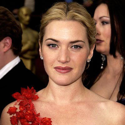 English Rose in 2002 Fresh-Faced in 1986, English Rose in 2002, Shimmery Y2K Makeup in 2004, Romantic Curls in 2005, '60s-Inspired in 2007, Beach Blonde in 2008, Windswept in 2009, Red Carpet Glam in 2009, Mini Pompadour in 2011, Sideswept in 2012, Classic Hollywood in 2012, Effortless Waves and a Pink Pout in 2014, Subtle Smoky Eye in 2015, Hair Flip in 2016, Monochrome Pink Makeup in 2017, Face-Framing Updo in 2021, Shoulder-Length Curls in 2022, Simple Updo and Lip Tint in 2025