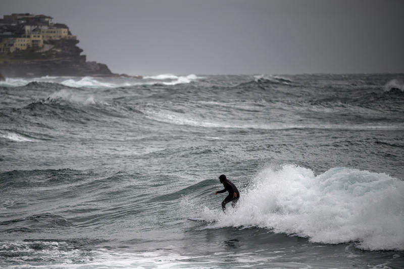 Key Points, Power to most houses to be restored tonight, energy company says, Mapped: Flood watches and warnings today, Entire NSW coastline under coastal hazard warning as dangerous surf continues, Photos: Waterlogging and fallen trees after heavy rain and winds batter NSW, SES responds to thousands of incidents as flash flooding threat grows, Repeated flooding likely to worsen, experts warn, Victoria border communities on watch as storm threatens to shift south, Travel chaos continues as 55 domestic flights cancelled, Low pressure system seen off the coast of NSW, Flood warnings issued for parts of Sydney, Power restored to 30,000 customers, thousands still in the dark, Authorities warn of higher number of emergency calls, What is a ‘bomb cyclone’?, More than 29,000 homes still without power, Severe weather to persist on Wednesday, forecasters say, 140 Sydney flights cancelled amid wild weather; travel insurance warning issued, Which direction is the coastal low heading?, Watch: Coastal residents told to 'evacuate now', Single runway operation begins at Sydney airport, Weather system expected to shift offshore on Wednesday, Qantas cancels arrival celebrations in Sydney for longest commercial flight, Climate change and warm oceans may be fuelling storm intensity, Summary: Here's what you need to know about the storm hitting Australia, Emergency services deployed as storm damage mounts, Over 20 road closures as storm wreaks havoc on NSW transport, Full story: Australia flights cancelled as bomb cyclone hits New South Wales, Power outages climb to 30,000 as storm batters NSW, Video: Wind gusts and large swells in Sydney, Ferries and trains suspended as storm causes major transport chaos in NSW, Mapped: Areas under rainfall and wind warning, Fallen trees spark car crashes on NSW coast, Tens of thousands without power as storm lashes NSW coast, Photos: Large swells seen at beaches, Severe weather to persist tomorrow, easing by Friday, forecasters say, Flights cancelled as storm disrupts Sydney Airport, 'Sheer size' of system is 'enormous', minister says, Emergency evacuations underway on Central Coast as storm batters coastline, 'Stay indoors’ warning as bomb cyclone pummels Australia’s east coast, Sydney Airport down to single runway as winds batter flights