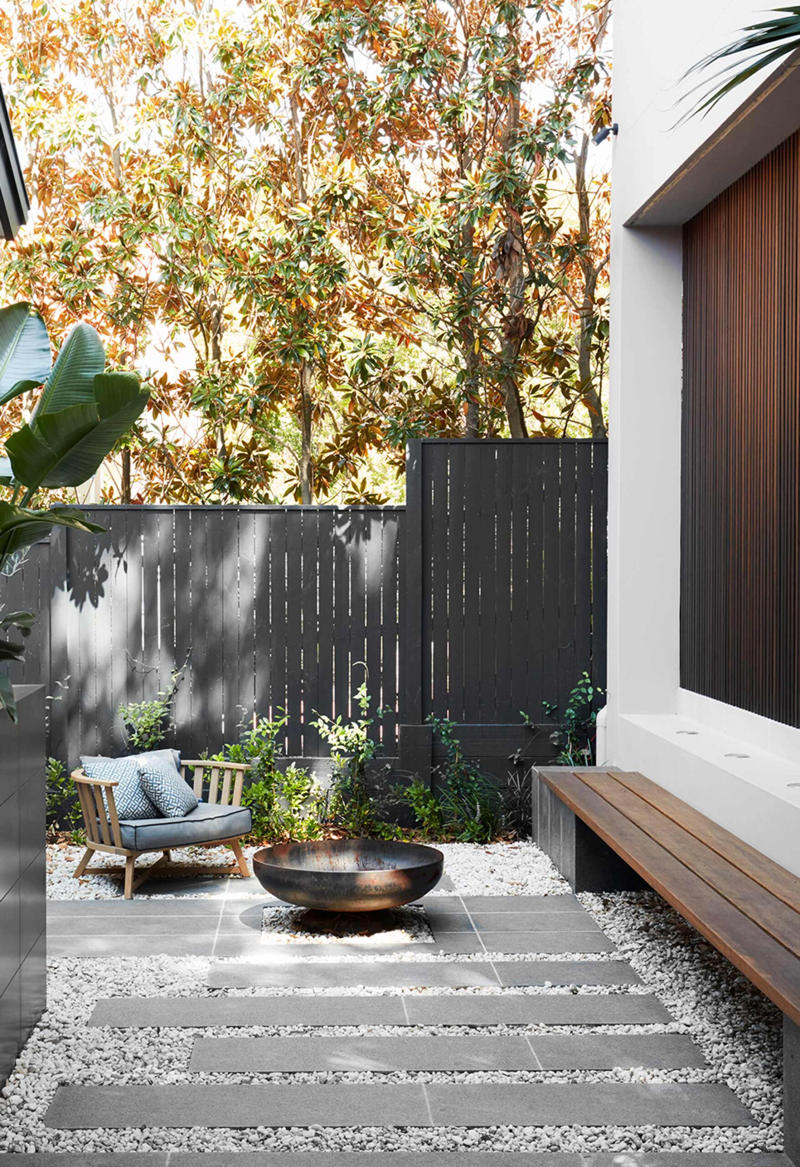 What should you put at the bottom of a fire pit? , What is the cheapest way to make a fire pit area? , What do you put in a fire pit to make it burn? , 22 fire pit area ideas to inspire,      A coastal escape   