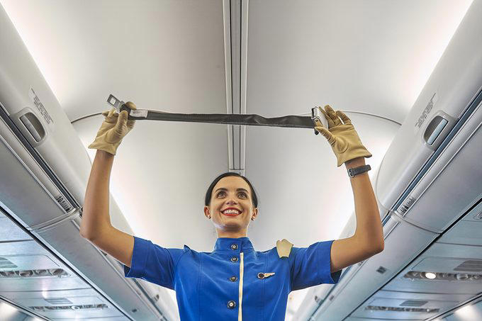 Pay attention to the safety demonstration, Consider booking a middle seat—maybe, Opt for the back of the plane or an exit row, Dress appropriately, Wear the right type of shoes, Bring a car seat for young children, Follow directions, Brace for impact, Protect yourself from the smoke, Leave your bag, and grab supplies, if possible, Move away from the plane, About the experts, Why trust us, Sources: