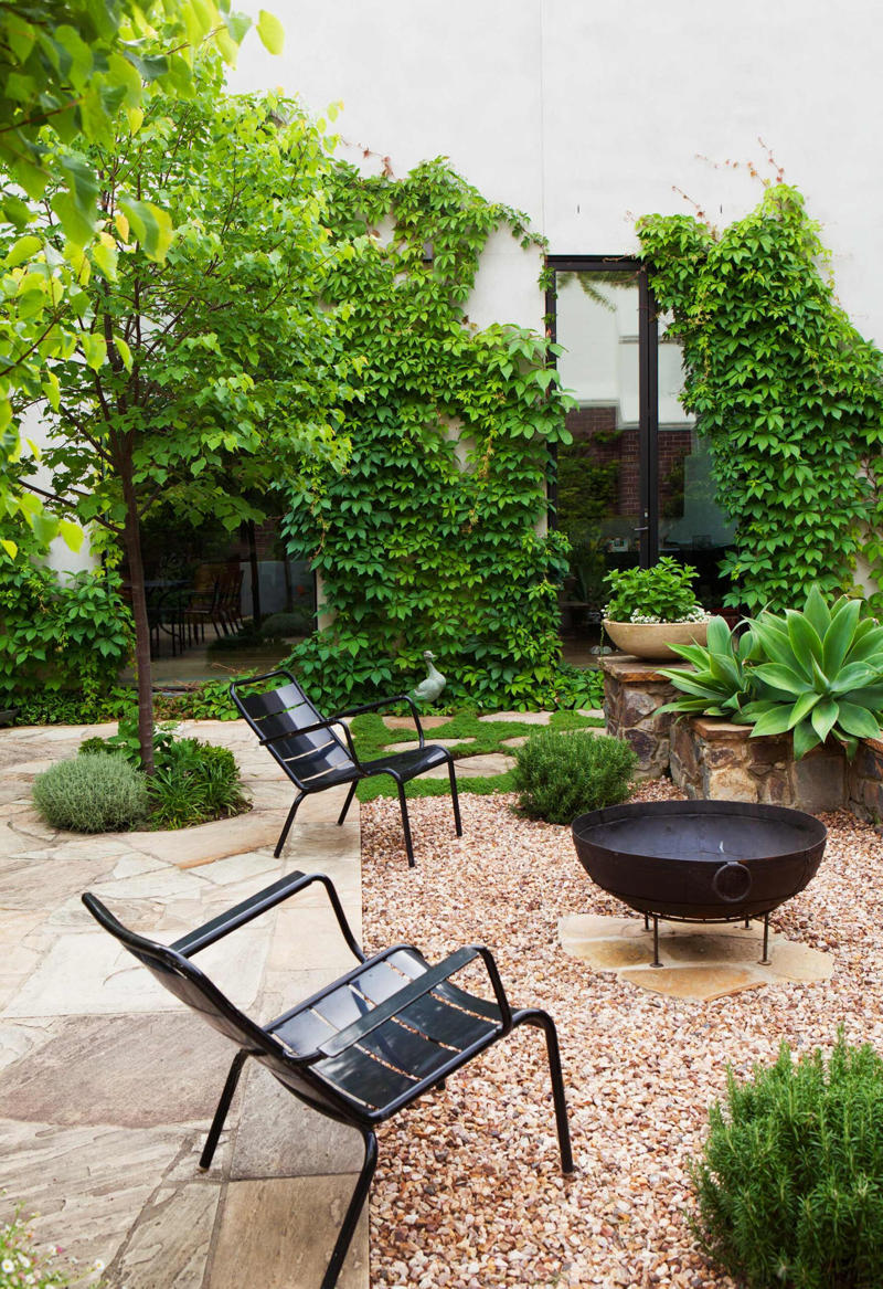 What should you put at the bottom of a fire pit? , What is the cheapest way to make a fire pit area? , What do you put in a fire pit to make it burn? , 22 fire pit area ideas to inspire,      A coastal escape   