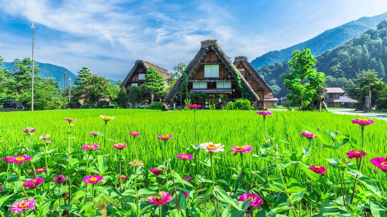 2. Shirakawa-go, Japan Cradled by mountains and wrapped in thatch, Shirakawa-go holds firm to tradition. Its steep-roofed farmhouses, designed to endure snow and time, glow amber at dusk. The seasons arrive like guests—welcomed, noticed, remembered. (Image: Canva) 1. Hallstatt, Austria Balanced between lake and limestone, Hallstatt reads like a forgotten chapter from an alpine fable. Its salt-stained history, mirrored waters, and slate-roofed homes draw quiet reverence, not crowds. In winter, it feels paused; in summer, painted. (Image: Canva), 2. Shirakawa-go, Japan Cradled by mountains and wrapped in thatch, Shirakawa-go holds firm to tradition. Its steep-roofed farmhouses, designed to endure snow and time, glow amber at dusk. The seasons arrive like guests—welcomed, noticed, remembered. (Image: Canva), 3. Colmar, France Colmar does not ask for attention—it commands it. With its riot of half-timbered homes, canal reflections, and Alsatian flourishes, it walks the line between theatre and truth. Even its shadows are deliberate. (Image: Canva), 4. Bibury, England Set beside the Coln and stitched into the hills, Bibury whispers of England before speed. Honey-coloured cottages in tight rows, trout streams that glisten without reason, and hedgerows that seem older than maps. (Image: Canva), 5. Giethoorn, Netherlands There are no cars in Giethoorn. Only boats, bridges, and hushed conversations. It is a village that floats, slowly, in its own rhythm. The canals speak softly; the thatched roofs never hurry. (Image: Canva), 6. Reine, Norway Beyond the Arctic Circle lies Reine—a scattering of crimson cabins that appear borrowed from a painting. Mountains rise like frozen waves behind them, and the sea never stops watching. Reine is remote, but never empty. (Image: Canva), 7. Eze, France High above the Riviera, where the cliffs fall into blue, sits Eze—a village of stone and shadow. Its alleys twist upward as if climbing toward memory. Time lingers here, in the scent of thyme and sea. (Image: Canva), 8. Goreme, Turkey Caves carved by wind and wonder—Goreme belongs to the Earth, not to man. Fairy chimneys pierce the sky, and hot-air balloons rise like thoughts at dawn. It is a village of both ground and sky. (Image: Canva), 9. Dinant, Belgium Hemmed in by cliff and river, Dinant feels composed rather than built. Saxophones hang from bridges, limestone watches from above, and the Meuse flows through it like a quiet refrain. Gothic never looked so lyrical. (Image: Canva), 10. Leavenworth, Washington, USA This village is not a replica—it’s a reinvention. Bavarian beams beneath American skies, brats beside apple pie. Surrounded by pine, performance, and peaks, Leavenworth is both celebration and curiosity, wrapped in wood and wonder. (Image: Canva)