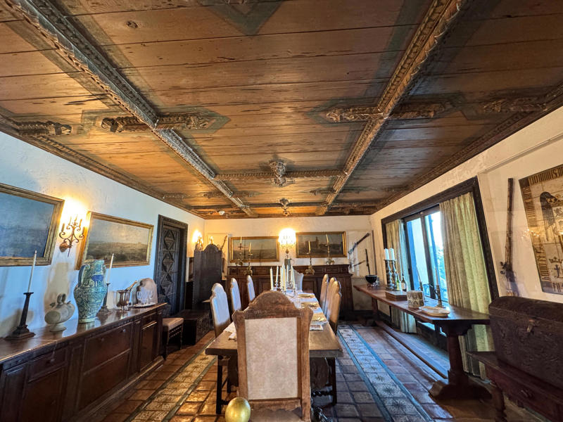 The first room I saw was the dining room. Inside the grounds are hiking trails, gardens, and a gift shop., Before I toured the home, I visited the museum grounds., But the landscaping was still immaculate., Then it was time to head over to Eagle's Nest., One side of the mansion is a natural history museum., The first room I saw was the dining room., The ceiling is constructed from Florida cedar, or Southern Red cedar., This is her changing room and bathroom., The house was set on a hill, so the yard was multi-level., First, I walked to the right., There was a large reflecting pool., But the main attraction was, once again, the view., To my surprise, it was a filled-in saltwater pool., They'd even left the ladder in., There were also changing rooms.