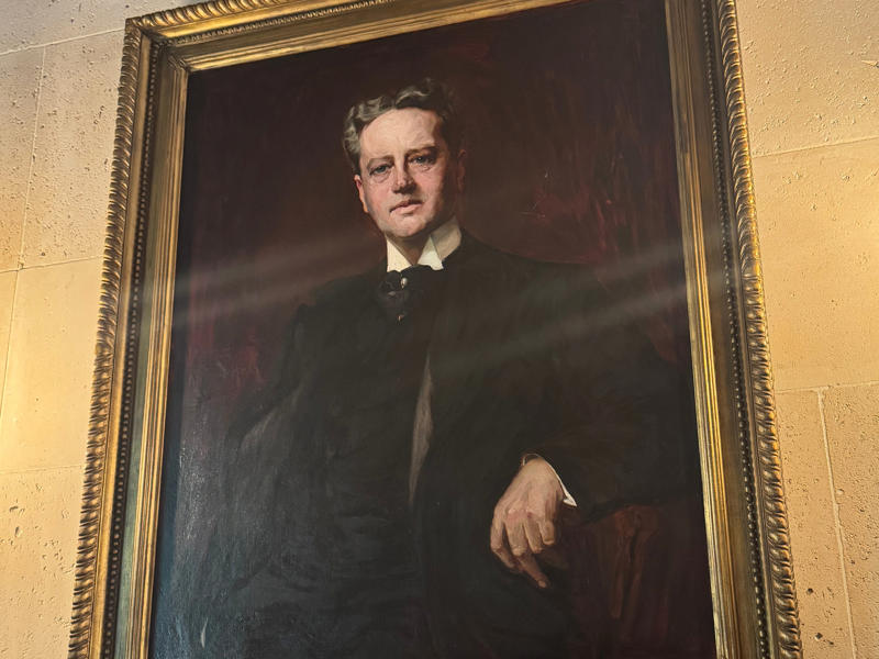 There are portraits of William II's family in the entryway. This is his father, William Kissam Vanderbilt. He ran an arena you may have heard of: Madison Square Garden. Inside the grounds are hiking trails, gardens, and a gift shop., Before I toured the home, I visited the museum grounds., But the landscaping was still immaculate., Then it was time to head over to Eagle's Nest., One side of the mansion is a natural history museum., The first room I saw was the dining room., The ceiling is constructed from Florida cedar, or Southern Red cedar., This is her changing room and bathroom., The house was set on a hill, so the yard was multi-level., First, I walked to the right., There was a large reflecting pool., But the main attraction was, once again, the view., To my surprise, it was a filled-in saltwater pool., They'd even left the ladder in., There were also changing rooms.