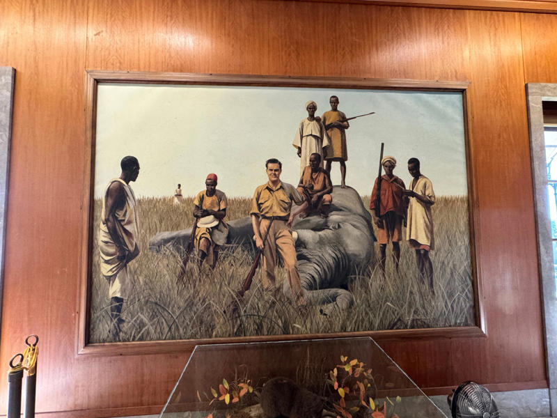 This is a portrait of William III during a safari in 1931. He died two years later in a car crash at 26. Inside the grounds are hiking trails, gardens, and a gift shop., Before I toured the home, I visited the museum grounds., But the landscaping was still immaculate., Then it was time to head over to Eagle's Nest., One side of the mansion is a natural history museum., The first room I saw was the dining room., The ceiling is constructed from Florida cedar, or Southern Red cedar., This is her changing room and bathroom., The house was set on a hill, so the yard was multi-level., First, I walked to the right., There was a large reflecting pool., But the main attraction was, once again, the view., To my surprise, it was a filled-in saltwater pool., They'd even left the ladder in., There were also changing rooms.