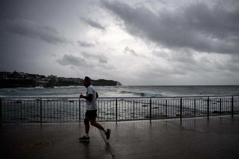 Key Points, Power to most houses to be restored tonight, energy company says, Mapped: Flood watches and warnings today, Entire NSW coastline under coastal hazard warning as dangerous surf continues, Photos: Waterlogging and fallen trees after heavy rain and winds batter NSW, SES responds to thousands of incidents as flash flooding threat grows, Repeated flooding likely to worsen, experts warn, Victoria border communities on watch as storm threatens to shift south, Travel chaos continues as 55 domestic flights cancelled, Low pressure system seen off the coast of NSW, Flood warnings issued for parts of Sydney, Power restored to 30,000 customers, thousands still in the dark, Authorities warn of higher number of emergency calls, What is a ‘bomb cyclone’?, More than 29,000 homes still without power, Severe weather to persist on Wednesday, forecasters say, 140 Sydney flights cancelled amid wild weather; travel insurance warning issued, Which direction is the coastal low heading?, Watch: Coastal residents told to 'evacuate now', Single runway operation begins at Sydney airport, Weather system expected to shift offshore on Wednesday, Qantas cancels arrival celebrations in Sydney for longest commercial flight, Climate change and warm oceans may be fuelling storm intensity, Summary: Here's what you need to know about the storm hitting Australia, Emergency services deployed as storm damage mounts, Over 20 road closures as storm wreaks havoc on NSW transport, Full story: Australia flights cancelled as bomb cyclone hits New South Wales, Power outages climb to 30,000 as storm batters NSW, Video: Wind gusts and large swells in Sydney, Ferries and trains suspended as storm causes major transport chaos in NSW, Mapped: Areas under rainfall and wind warning, Fallen trees spark car crashes on NSW coast, Tens of thousands without power as storm lashes NSW coast, Photos: Large swells seen at beaches, Severe weather to persist tomorrow, easing by Friday, forecasters say, Flights cancelled as storm disrupts Sydney Airport, 'Sheer size' of system is 'enormous', minister says, Emergency evacuations underway on Central Coast as storm batters coastline, 'Stay indoors’ warning as bomb cyclone pummels Australia’s east coast, Sydney Airport down to single runway as winds batter flights