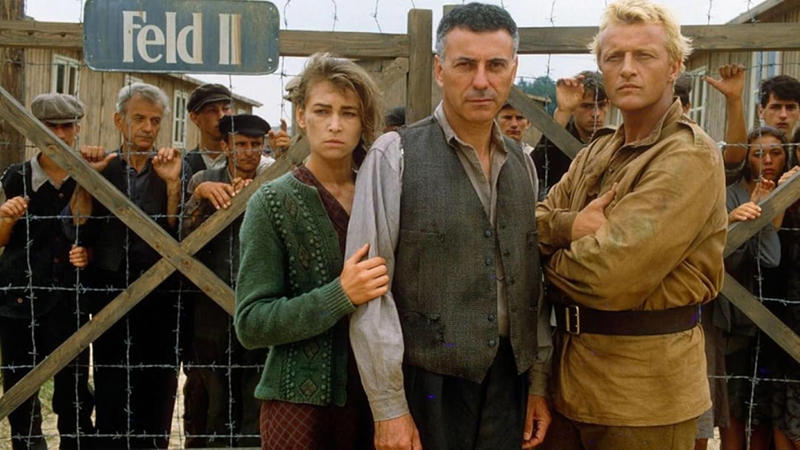 15. Escape from Sobibor (1987) 25. Jojo Rabbit (2019), 24. The Zookeeper’s Wife (2017), 23. The Reader (2008), 22. Defiance (2008), 21. Downfall (2004), 20. Conspiracy (2001), 19. The Grey Zone (2001), 18. The Counterfeiters (2007), 17. Ida (2013), 16. The Boy in the Striped Pyjamas (2008), 15. Escape from Sobibor (1987), 14. The Pawnbroker (1964), 13. Inglourious Basterds (2009), 12. Au revoir les enfants (1987), 11. Son of Saul (2015), 10. Europa Europa (1990), 9. Come and See (1985), 8. Judgment at Nuremberg (1961), 7. Sophie’s Choice (1982), 6. Life Is Beautiful (1997), 5. The Zone of Interest (2023), 4. The Diary of Anne Frank (1959), 3. Shoah (1985), 2. The Pianist (2003), 1. Schindler’s List (1993)