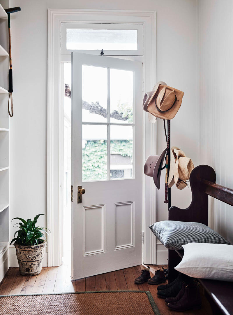 27 charming country home entryway ideas,      Wrought metal screen   ,      Light and bright   ,      Vintage art   ,      Pink door   ,      Cosy seating   ,      Hats off   ,      Antique church pew   ,      Hand-painted windows   ,      Rattan lamp shade   ,      Glass corridors   ,      Light-filled   ,      Gallery wall   ,      Soaring ceilings   ,      Weatherboard walls   ,      Checkerboard   ,      French doors   ,      Mudroom entrance   ,      Symmetrical plantings   ,      Built-in bench seat   ,      Statement runner   ,      Antique pieces   ,      Leadlight windows   ,      Small study nook   ,      Dark herringbone tiles   ,      All white   ,      Yellow door   ,      Dark timber joinery   