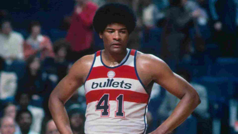 Atlanta Hawks – Dominique Wilkins, Boston Celtics – Bill Russell, Brooklyn Nets – Jason Kidd, Charlotte Hornets – Kemba Walker, Chicago Bulls – Michael Jordan, Cleveland Cavaliers – LeBron James, Detroit Pistons – Isiah Thomas, Indiana Pacers – Reggie Miller, Miami Heat – Dwyane Wade, Milwaukee Bucks – Kareem Abdul-Jabbar, New York Knicks – Patrick Ewing, Orlando Magic – Dwight Howard, Philadelphia 76ers – Julius Erving, Toronto Raptors – Kyle Lowry, Washington Wizards – Wes Unseld, Dallas Mavericks – Dirk Nowitzki, Denver Nuggets – Nikola Jokić, Golden State Warriors – Stephen Curry, Houston Rockets – Hakeem Olajuwon, LA Clippers – Chris Paul, Los Angeles Lakers – Magic Johnson, Memphis Grizzlies – Marc Gasol, Minnesota Timberwolves – Kevin Garnett, New Orleans Pelicans – Anthony Davis, Oklahoma City Thunder – Kevin Durant, Phoenix Suns – Steve Nash, Portland Trail Blazers – Clyde Drexler, Sacramento Kings – Chris Webber, San Antonio Spurs – Tim Duncan, Utah Jazz – Karl Malone