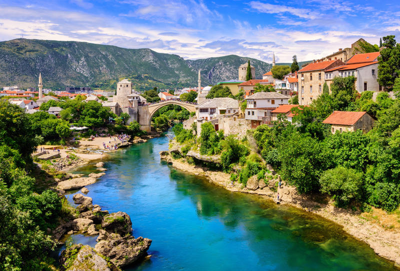 Mostar, Bosnia & Herzegovina Colmar, France, Blessington, Ireland, Annecy, France, Ghent, Belgium, Cotswold, England, Domburg, Netherlands, Saranda, Albania, Rothenburg ob der Tauber, Germany, Graz, Austria, Verona, Italy, Basel, Switzerland, Brno, Czechia, Novi Sad, Serbia, Timisoara, Romania, Nafplio, Greece, Malmo, Sweden, Arcachon, France, Mostar, Bosnia & Herzegovina, Malaga, Spain