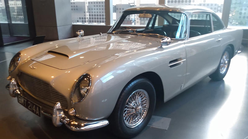Cars That Carry A Flag, Lamborghini Miura, The Answer, Toyota 2000GT, Volkswagen Beetle, Ford GT40, Citroen DS, Datsun 240Z, Rolls-Royce Phantom, Renault 5 Turbo, Chevrolet Corvette C1, Koenigsegg Jesko, Fiat 500 (Cinquecento), Aston Martin DB5, Hyundai Pony, Tatra 87, Mazda MX-5 Miata NA, BMW M3 E30, Volvo P1800, Peugeot 205 GTI, Pontiac Firebird Trans Am, Pagani Zonda, SAAB 900 Turbo, Porsche 911 (1964)