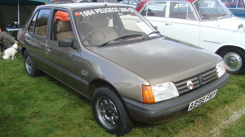Cars That Carry A Flag, Lamborghini Miura, The Answer, Toyota 2000GT, Volkswagen Beetle, Ford GT40, Citroen DS, Datsun 240Z, Rolls-Royce Phantom, Renault 5 Turbo, Chevrolet Corvette C1, Koenigsegg Jesko, Fiat 500 (Cinquecento), Aston Martin DB5, Hyundai Pony, Tatra 87, Mazda MX-5 Miata NA, BMW M3 E30, Volvo P1800, Peugeot 205 GTI, Pontiac Firebird Trans Am, Pagani Zonda, SAAB 900 Turbo, Porsche 911 (1964)